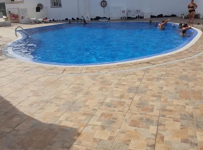 Junto A La Piscina Apartment *